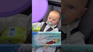 5 month old reads at lunch