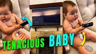 Precious Baby Refuses to Give Mom the Remote Control