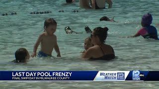 People flock to pools to cool off on  Labor Day