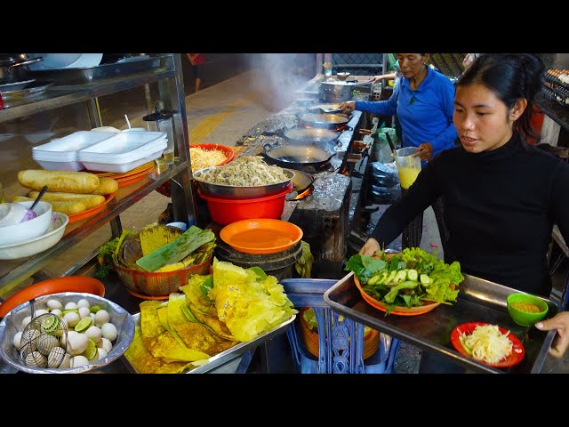 A Good Place to Eat Yellow Pancake, Spicy Grilled Snail, Beef Skewers & More Cambodian Street Foods class=