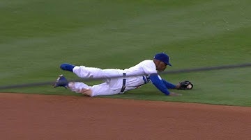 COL@LAD: Rollins dives, throws to first from a knee