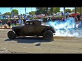 Classic Muscle Cars leaving a Car Show in Huntington Beach