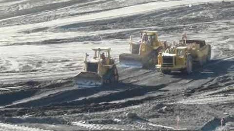 D10N & D10T pushcats double pushing a 651B scraper