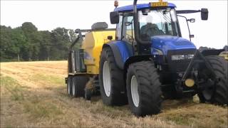 New Holland TM140 Baling Round Bales.