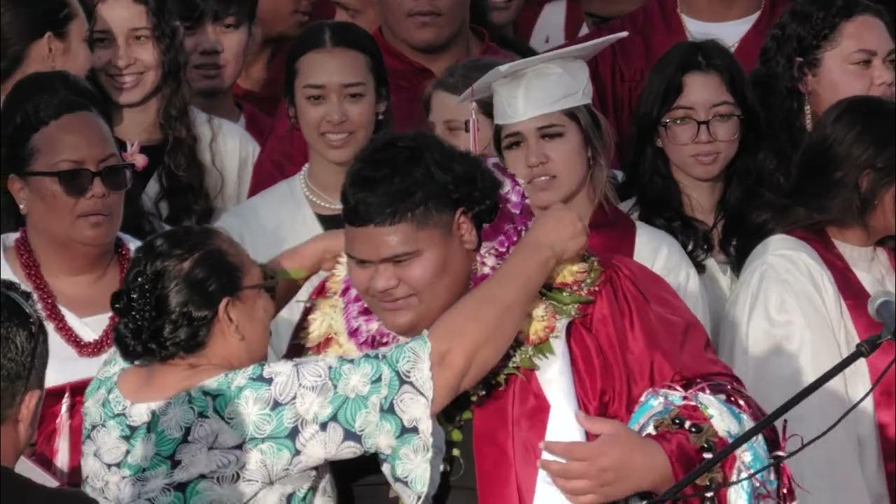 Iam Tongi recieving Leis from his relatives at his Kahuku Graduation
