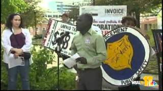 Protest Held Outside Post Office On Tax Day