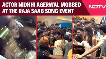 Nidhhi Agerwal Mobbed At The Raja Saab Song Event At Lulu Mall In Hyderabad