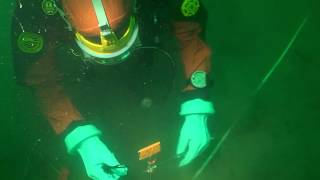EPA divers conduct sampling at the Superfund Site with Solid Phase Microextraction Devices