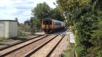 Class 153/156 pass through Swineshead Station & Class 158 passes old Station at Sibsey 01/07/11