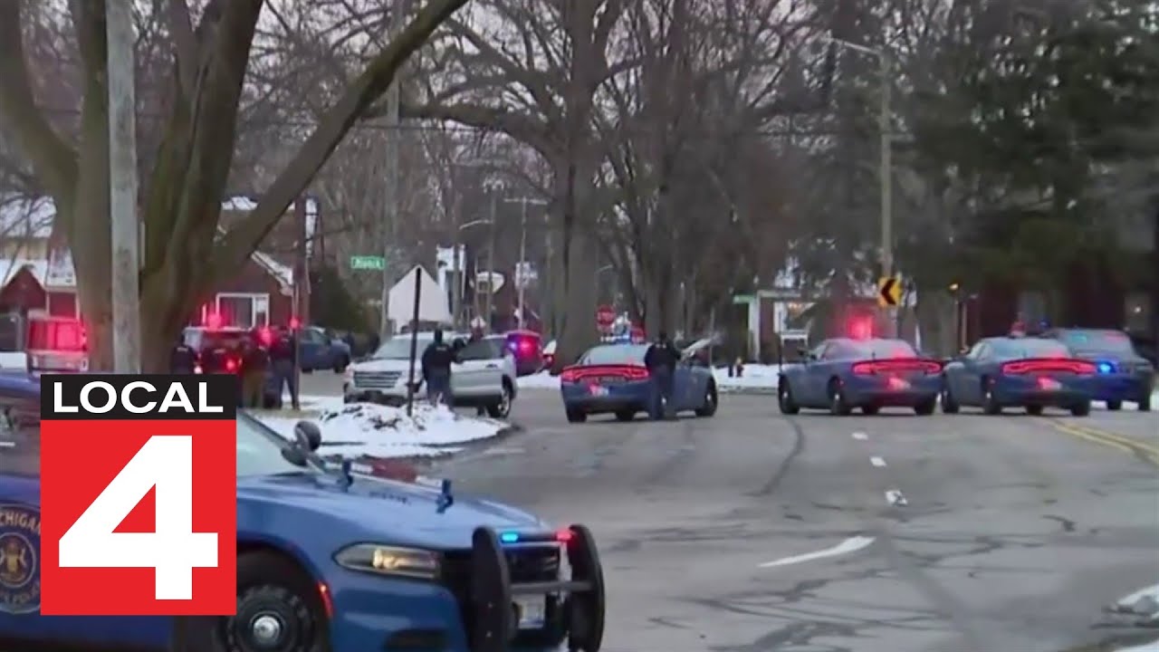 2 troopers and suspect shot during raid on Detroit's west side