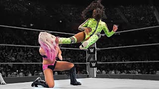 Naomi brutalizing Alexa Bliss