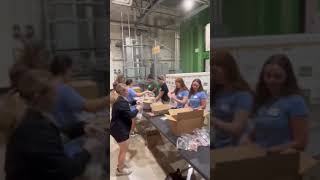 Tulane Bowling having some fun as we volunteer at Second Harvesters of GNO this morning!!! #RollWave