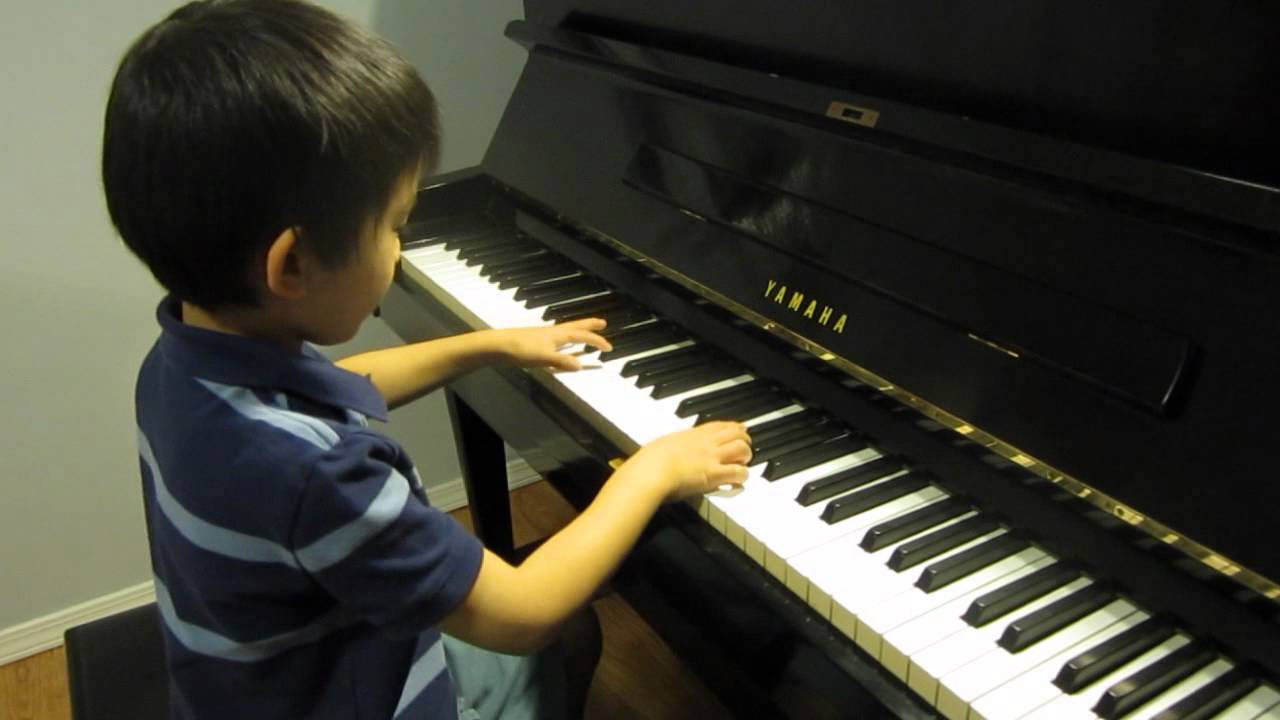 He can play piano. Indian boy Piano. John was 8 years old. He Play the Piano. A teenboy Plays the Piano.