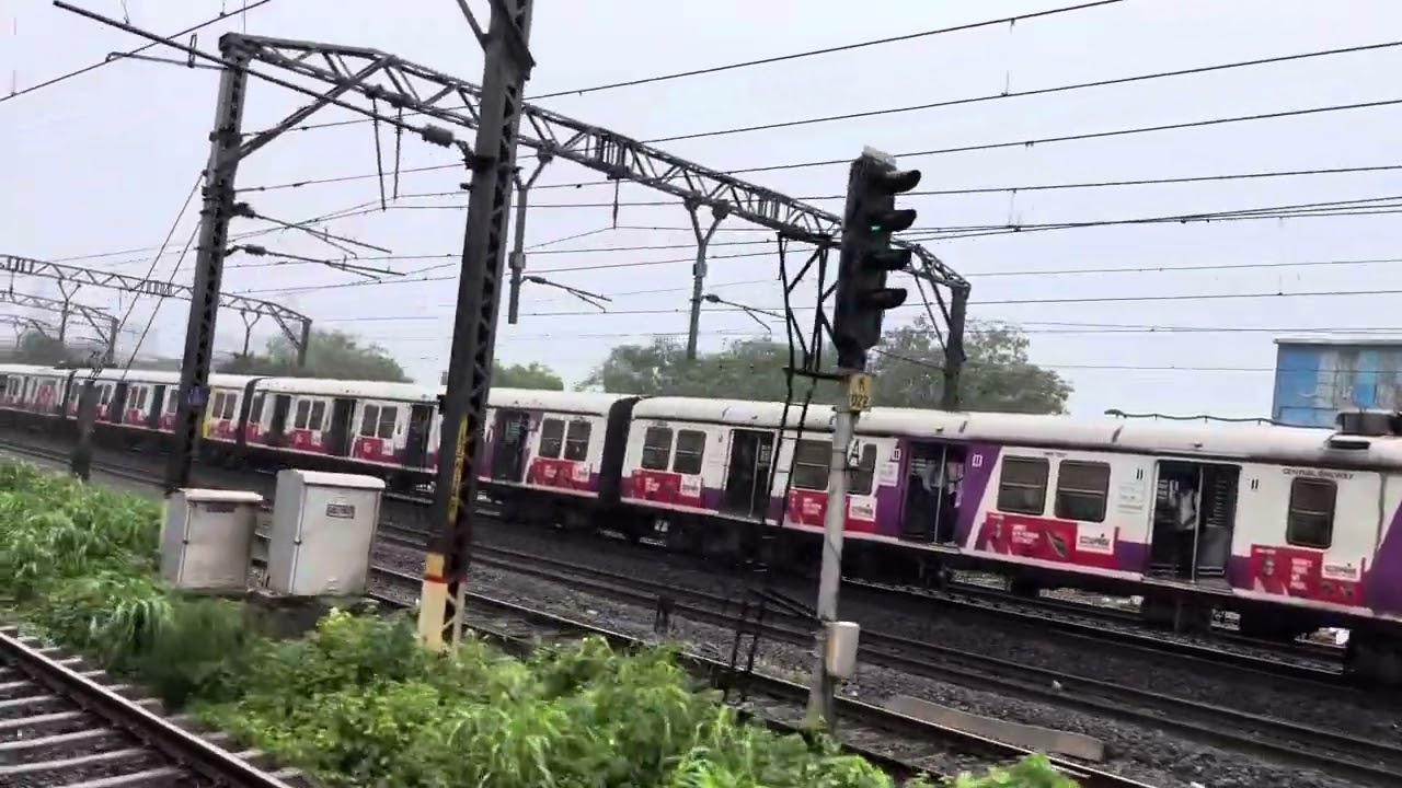 Mumbai local slow by rain #mumbailocal #local #rain 