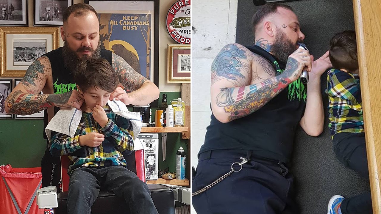 Barber Lays On The Floor For Boy With Autism
