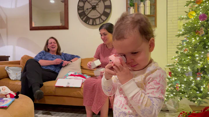 Morgan opening presents with Grandmama, Papa, Loga...