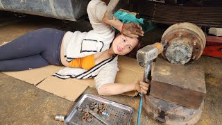 Genius girl repairs and restores cars.