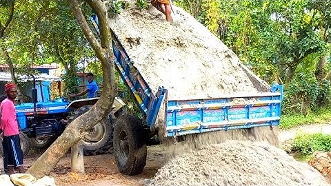 Sand is loaded from the river into tractor and unload over rough roads through hydraulic facilitie 7
