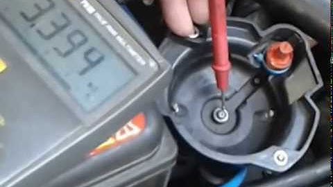 Testing carbon brush rotor contact of Distributor Cap