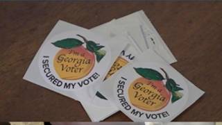 Georgia unveils new voting sticker design