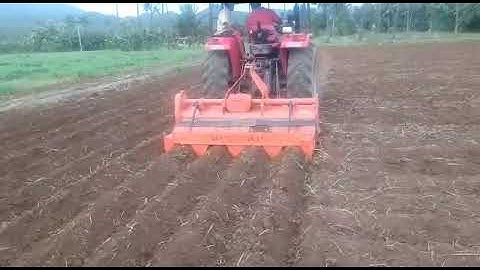 "Transform Your Fields: SarvaShakthi Rotavator with 42 Blades & 4 Ridges in Action!"