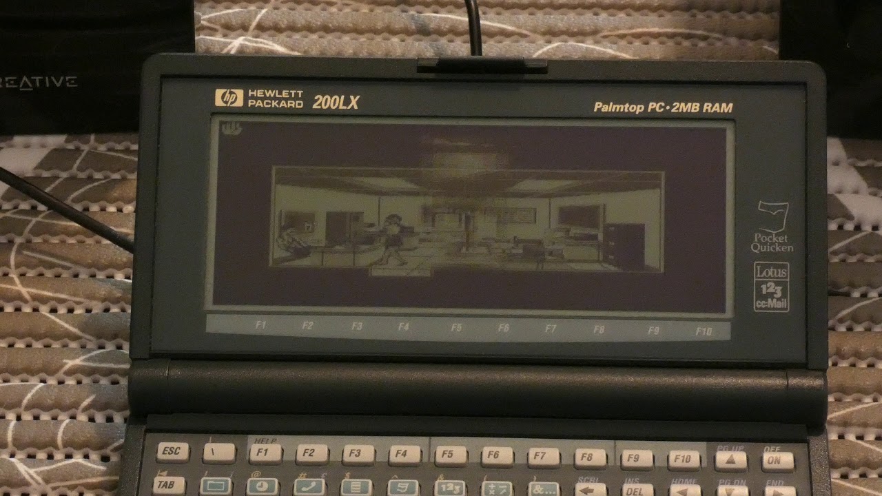HP200LX Palmtop PC with Adlib Soundcard plays Police Quest 2