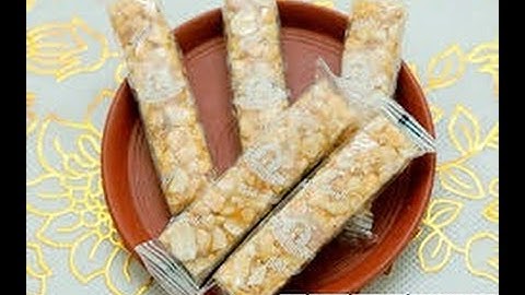 Máy đóng gói kẹo lạc cấp liệu tự động