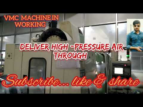 vmc machine in working process  drilling & tapping operation