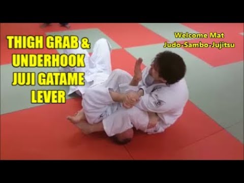 THIGH GRAB AND UNDERHOOK JUJI GATAME ARM LEVER