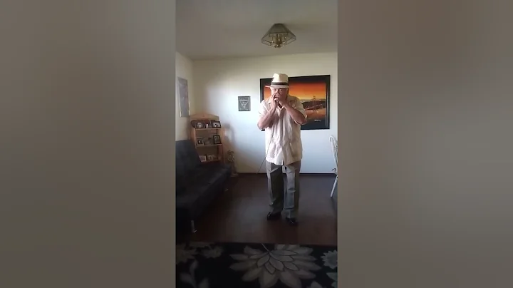 Playing the harmonica again, Steve Venegas.