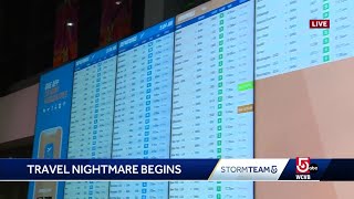 Busy morning at Logan as holiday travelers try to beat storm