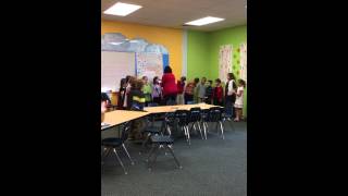 1st, 2nd, and 3rd graders practicing "The 12 Days of Christmas"