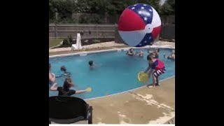ball gif - kids falling over beach ball gif