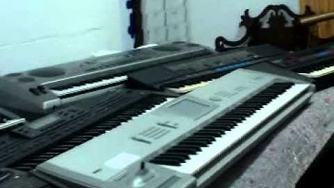 Kris Nicholson Shows Off All Of The Keyboard In His Piano Shop To Be Put In The New Room.MPG