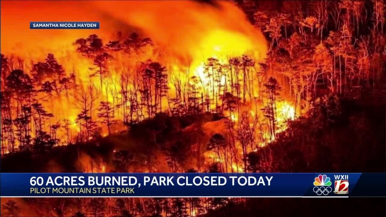 Pilot Mountain still burning Sunday morning