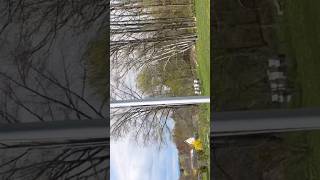 Golf ball hit one hand no looking