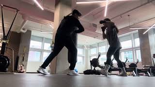 Lead hook step to southpaw hook side kick on the heavy bag