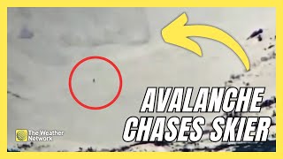 Webcam Spots Avalanche Chasing Snowboarder Down Mountain