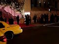 Steve sands paparazzi is  pushed to the ground  outside the met gala by security