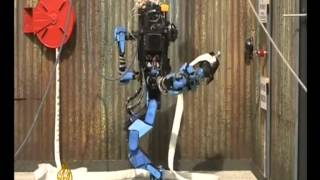 Disaster robots compete in Darpa's Florida challenges