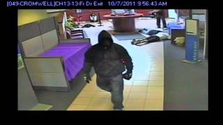 Armed bank robbers still at large