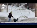 Millions wake to winter storm as system moves east