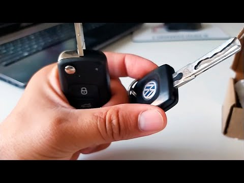 Видео: Замена обычного ключа на выкидной радио ключ с ДУ на VW, Skoda, Audi, Seat.