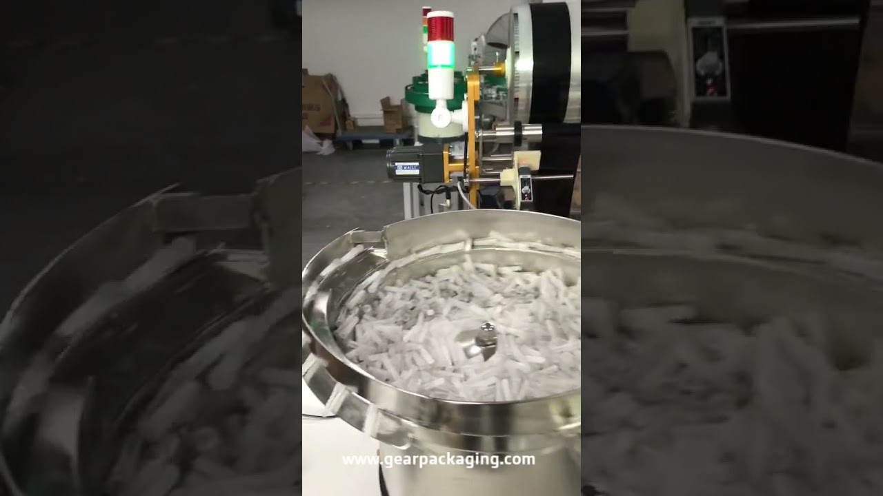 Automatic double bowl hardware counting filling bag packaging machine running video