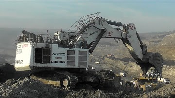 Liebherr R9350 Loading Komatsu HD785 And Caterpillar 777 - Coal Mining Operations