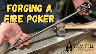 Blacksmith Forging A Fire Poker