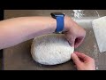 Shaping a seven grain porridge black sesame seed sourdough batard