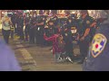 Police officer, protester shake hands and take a knee during Sacramento's George Floyd demonstration