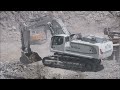 Liebherr R976 feeding a Metso mobile crusher