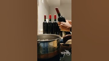 Easiest way to add shrink top cap to wine bottles